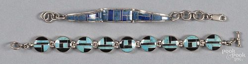 Two Navajo silver and stone bracelets.