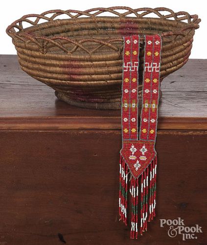 Native American beaded sash, ca. 1900, together with a basket.