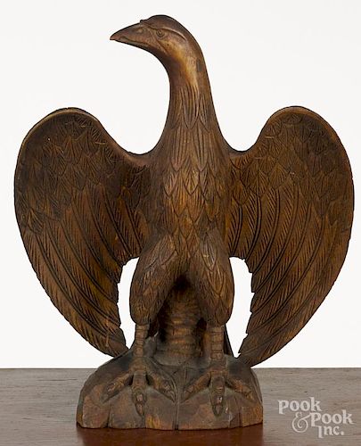 Carved pine spread wing eagle, 19th c., 14 1/2'' h.
