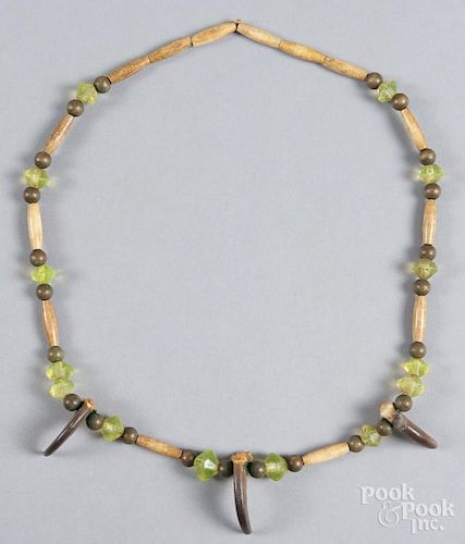 Native American bear claw necklace.