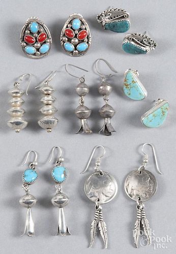 Seven pairs of Native American silver and hardstone earrings.