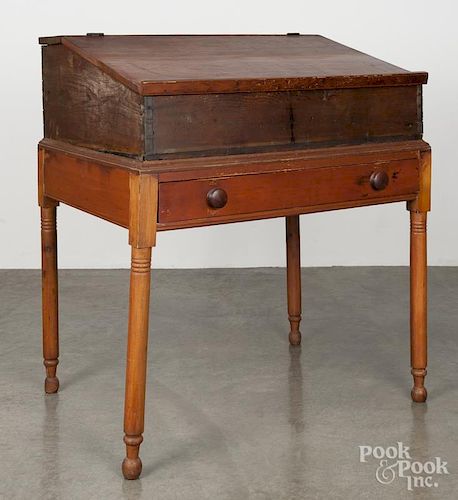 Pennsylvania Sheraton stained pine schoolmaster's desk, 19th c., 40'' h., 36'' w.