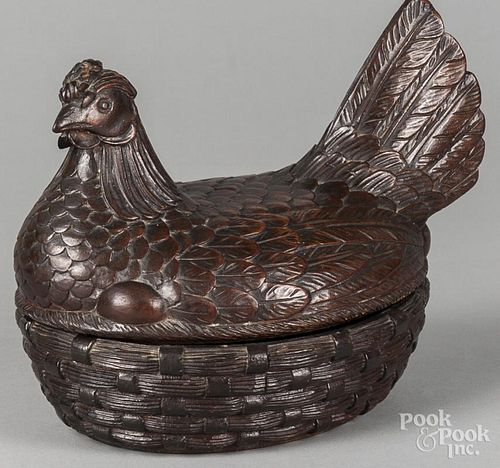 Carved pine hen on a nest, 19th c., 7 3/4'' h., 10 1/2'' w.