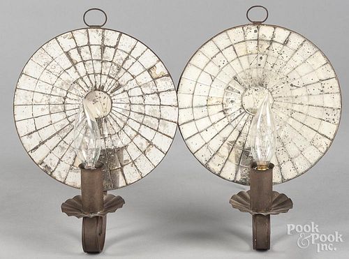 Pair of tin mirrored sconces, early 20th c., 10'' h.