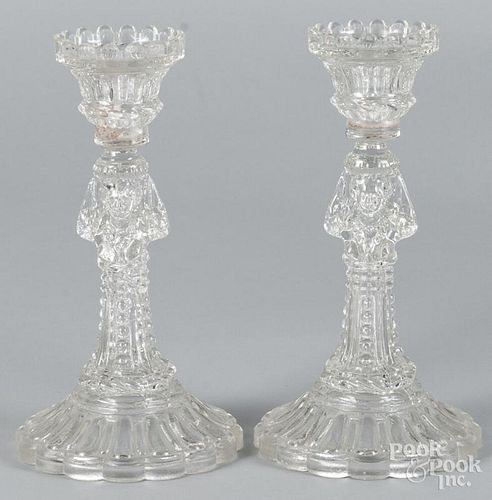 Pair of colorless glass figural candlesticks, early 20th c., 10 1/4'' h.