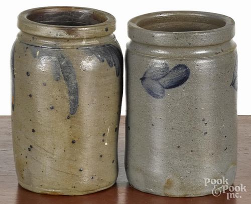 Two Pennsylvania stoneware jars, 19th c., with cobalt foliate sprays, 8 1/4'' h.