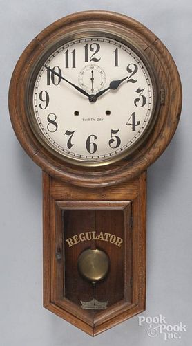 Waterbury oak regulator clock, 31'' h.