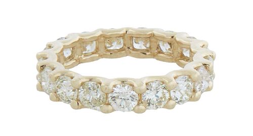 14K Yellow Gold Eternity Ring, with seventeen round prong set diamonds around the band, total diamond wt.- 3.12 cts., Size 6, with appraisaL.