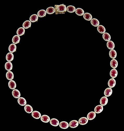 14K Yellow Gold Link Necklace, each of the thirty-six oval links with an oval Burmese ruby atop a border of tiny round diamonds, total ruby wt.- 47.38