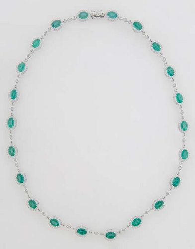 14K White Gold Link Necklace, each of the twenty-two oval links with an oval emerald atop a border of round diamonds, Total emerald wt.- 17.55 cts., t