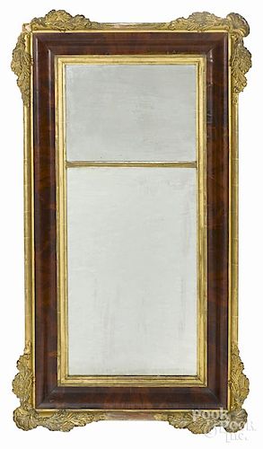 Empire mahogany and giltwood mirror, mid 19th c., 50 1/2'' x 28''.