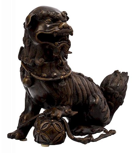 A CHINESE BRONZE STATUE OF A LION WITH A REMOVABLE HEAD, MING DYNASTY, 1368-1644