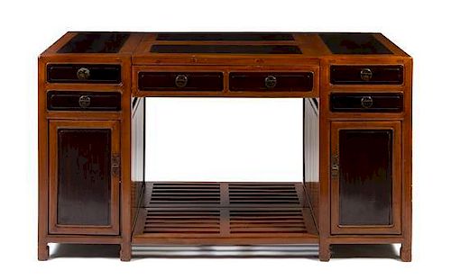 * A Chinese Mixed-Wood Partner's Desk Height 34 x width 60 1/2 x depth 30 1/4 inches.