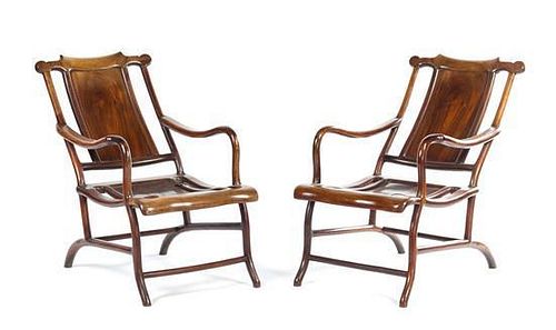 * A Pair of Chinese Hardwood Reclined Back Open Armchairs Height 35 inches.