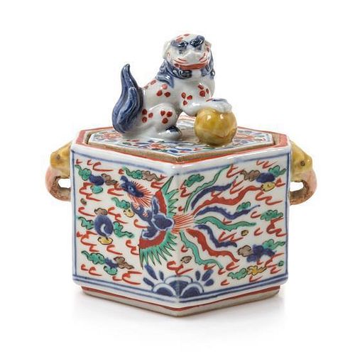 A Wucai Porcelain Lonzenge Form Box and Cover Height 4 1/2 inches.