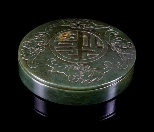 A Spinach Jade Circular Box and Cover Diameter 3 1/4 inches.