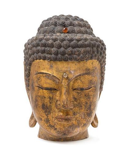 * A Carved Wood Head of Buddha Height 16 x width 9 x depth 9 inches.