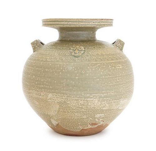 * A Yueyao Celadon Pottery Jar Height 9 1/8 inches.