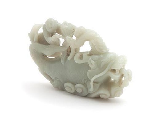 A Carved Celadon Jade Figural Group Length 6 1/4 inches.
