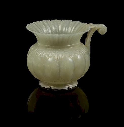 A Mughal-Style Carved Jade Vase Height 2 1/8 inches.