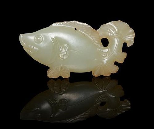 A Celadon Jade Fish-Form Pendant Length 2 3/4 inches.