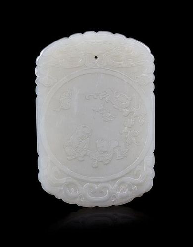A Pale Celadon Jade Pendant Height 2 1/4 inches.