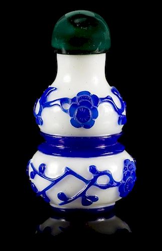 A Blue Overlay White Peking Glass Snuff Bottle Height 3 inches.