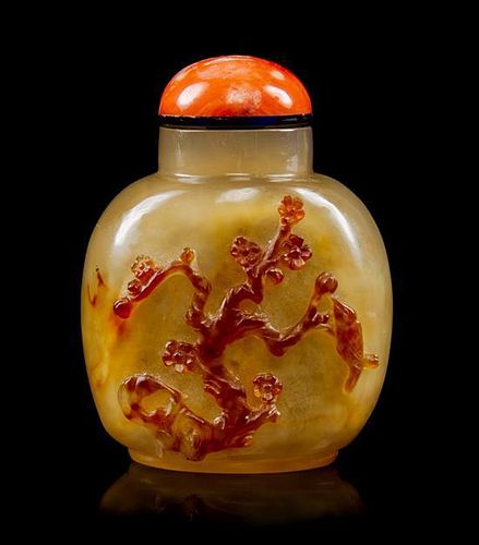 A Carved Agate Snuff Bottle Height 2 inches.
