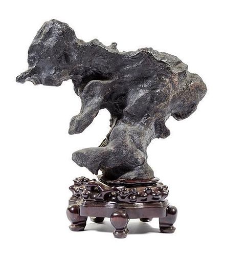 * A Chinese Lingbi Scholar's Rock Height overall 23 1/4 inches.