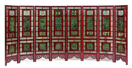 * A Large Chinese Spinach Jade Inset Rosewood Eight-Panel Floor Screen Height of each panel 66 x width 18 3/4 inches.