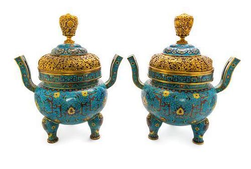 A Pair of Gilt Metal Mounted and Cloisonne Enamel Covered Tripod Censers Height 21 inches.
