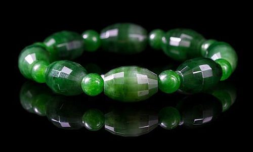 A Spinach Jade Beaded Bracelet Diameter 3 inches.