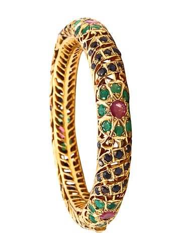 Mughal Bracelet in 19 kt yellow gold with 17.67 Cts in rubies emerald & sapphires