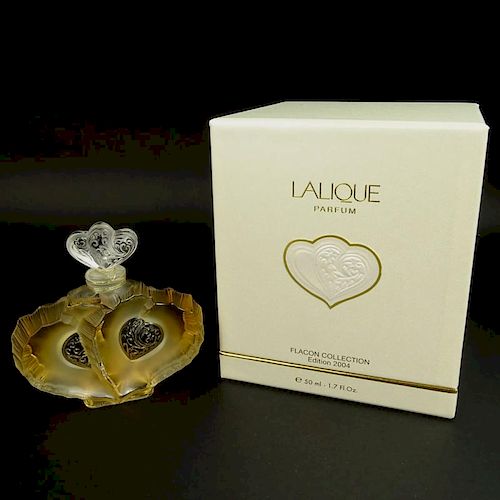 Boxed Lalique 1.7 fl. Oz Eau de Parfum Double Heart Bottle.