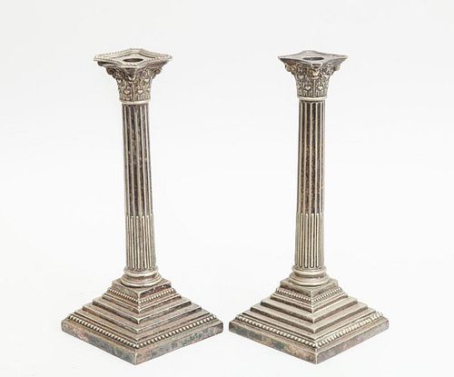 PAIR OF ENGLISH SILVER-PLATED CANDLESTICKS, WITH FIVE-LIGHT DISTRESSED CANDELABRA ARMS