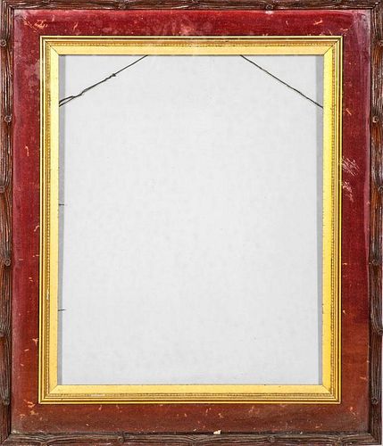 CONTINENTAL CARVED FRUITWOOD AND PARCEL-GILT PICTURE FRAME