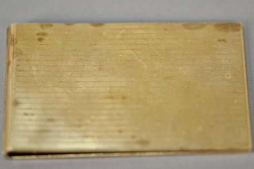 Cartier 14K gold mini pad holder. 
1 3/4" x 3", 42.3 grams