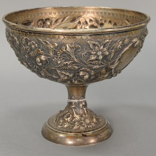Sterling silver repousse compote marked D + H 1876 sterling 185, monogrammed on foot and in shield. 
ht. 7 in.; dia. 8 in.; 15.9 t oz.