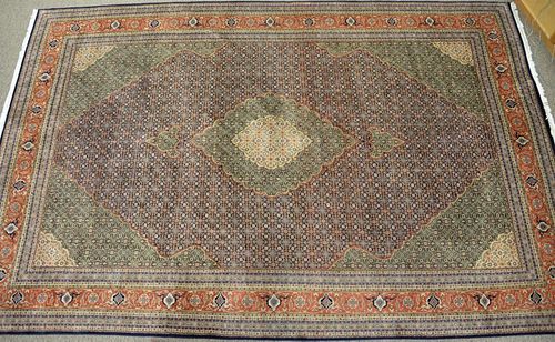 Room size Oriental carpet, mid to late 20th century. 
11'10" x 18'1"