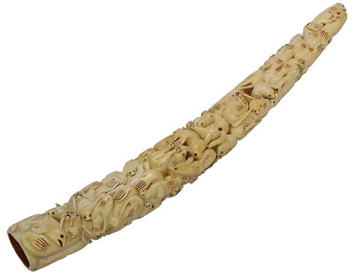 HIGHLY CARVED WALRUS TUSK, c.1925, 23"L