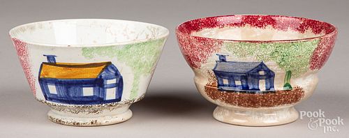Two red spatter waste bowls with blue schoolhouse