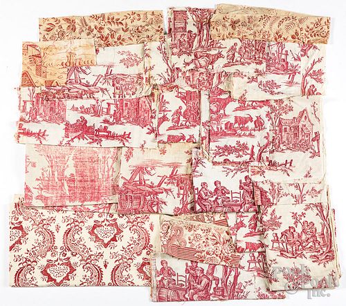 Red and white toile printed fabric pieces