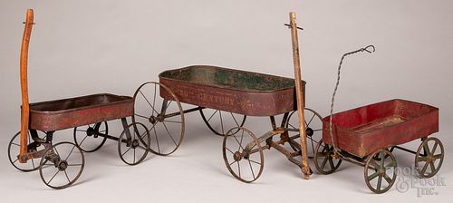 Three tin child's wagons, ca. 1900