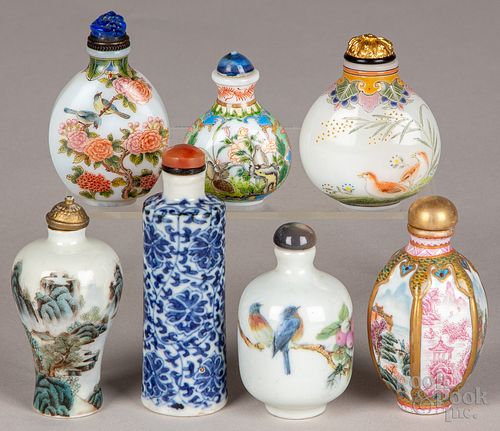 Seven Chinese porcelain and glass snuff bottles