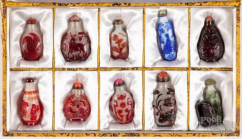 Ten Chinese carved Peking glass snuff bottles
