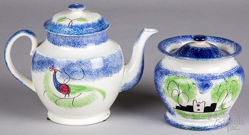 Blue spatter teapot with peafowl and a sugar