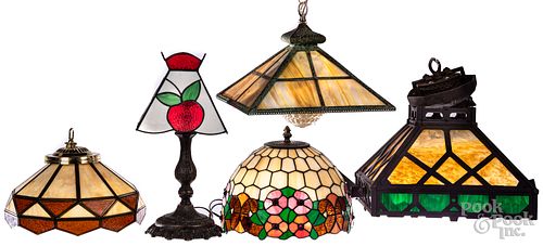 Four slag glass leaded lamp shades and a lamp