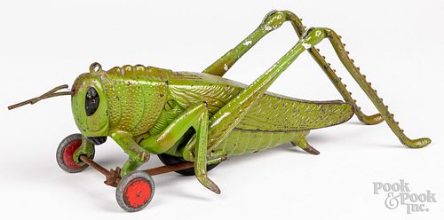 Hubley cast iron grasshopper pull toy