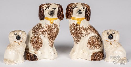 Two pairs of Staffordshire spaniels, 19th c.