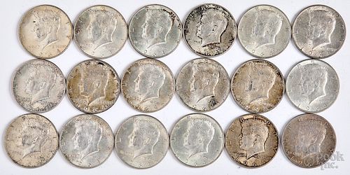 Eighteen 1964 Kennedy silver half dollars